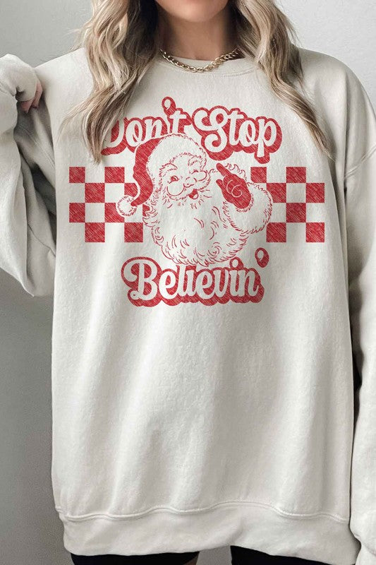 DON'T STOP BELIEVIN CHRISTMAS OVERSIZED SWEATSHIRT