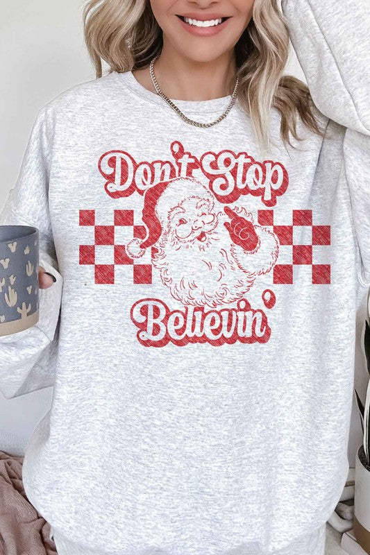 DON'T STOP BELIEVIN CHRISTMAS OVERSIZED SWEATSHIRT