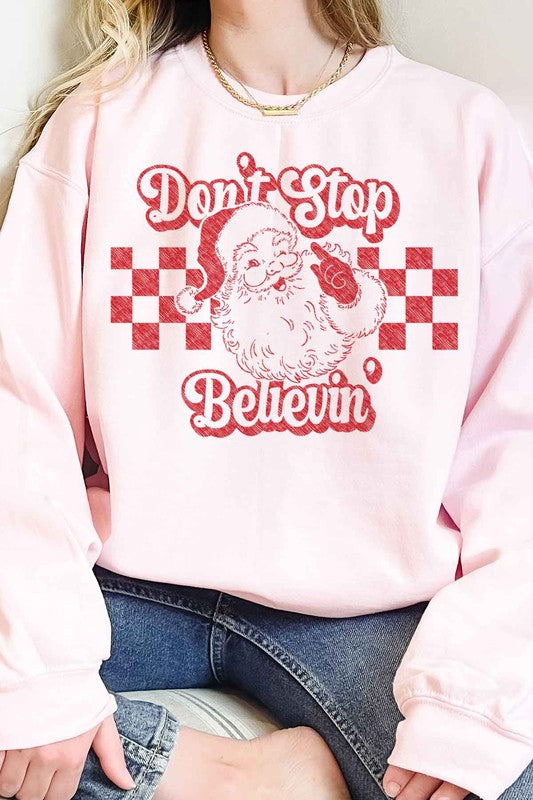 DON'T STOP BELIEVIN CHRISTMAS OVERSIZED SWEATSHIRT