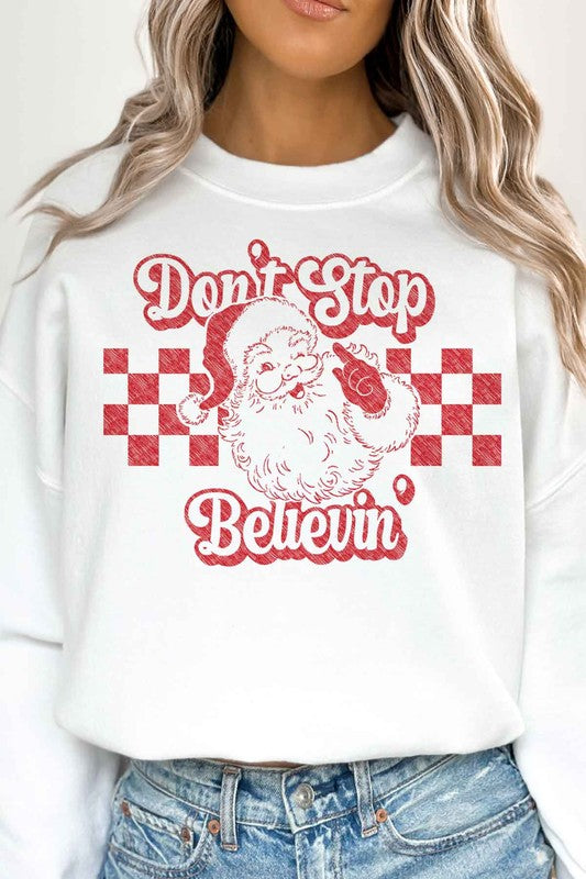 DON'T STOP BELIEVIN CHRISTMAS OVERSIZED SWEATSHIRT